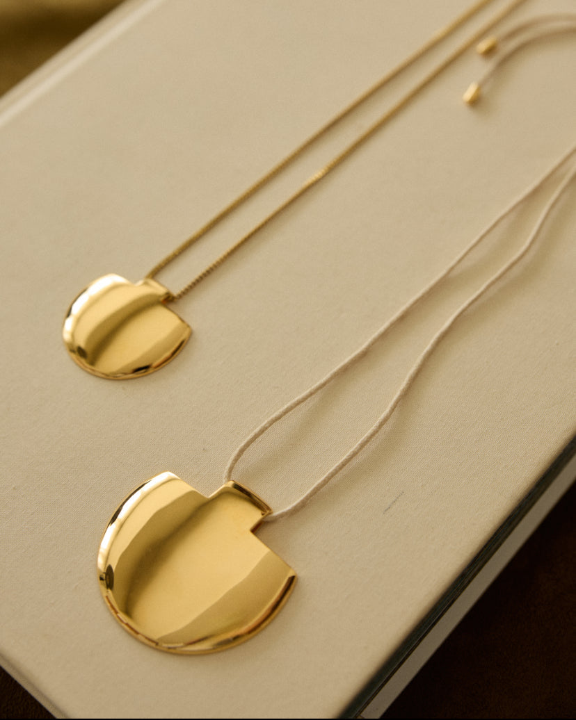 Golden pendant / ARC