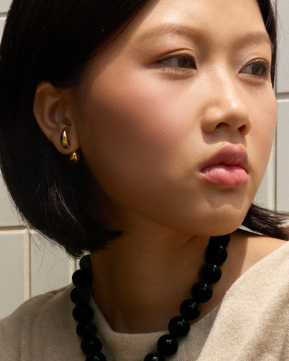 Golden earpiece / BUBBLE